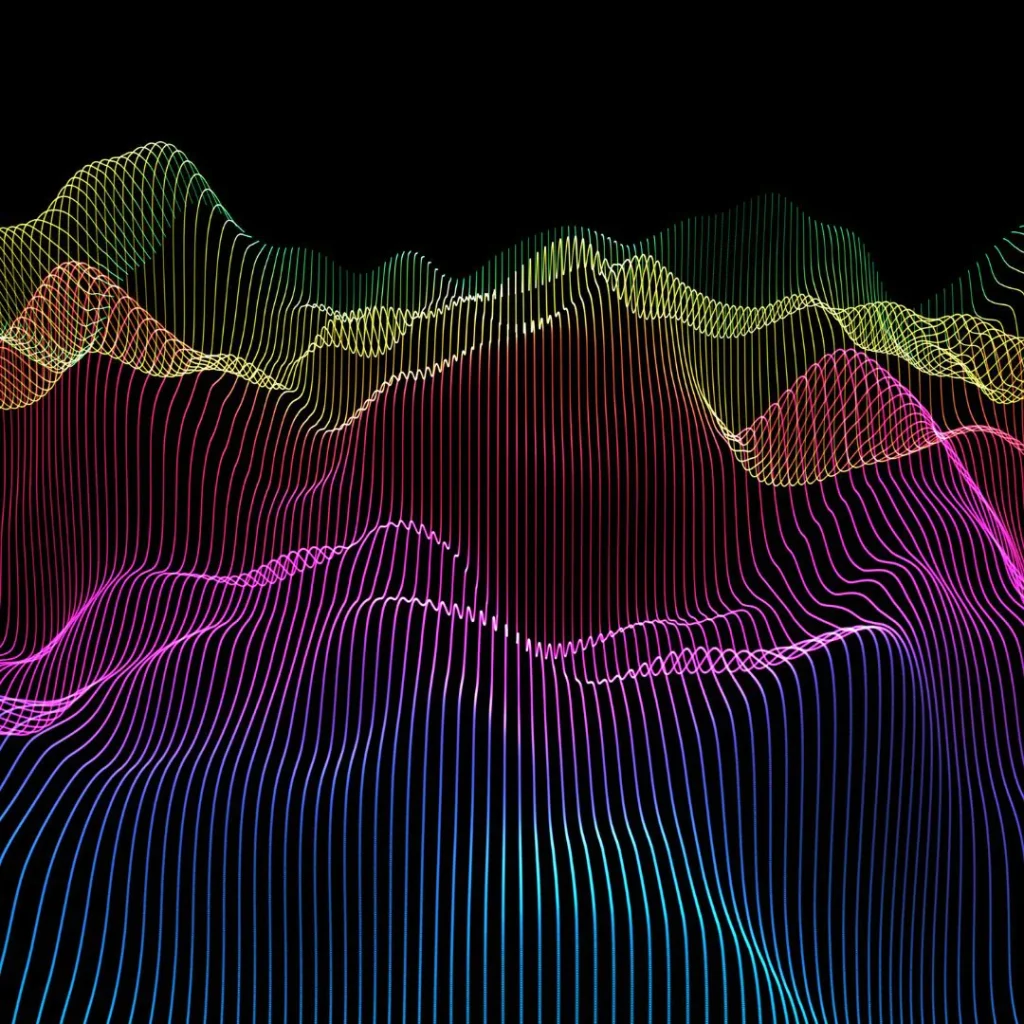 Graphique abstrait de lignes ondulées multicolores sur fond noir représentant la séparation des pistes audio en Stems.